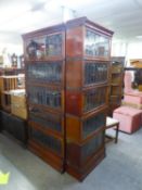 A PAIR OF EARLY TWENTIETH CENTURY GLOBE WERNICKE TYPE FIVE PART SECTIONAL BOOKCASES, WITH LEADED