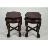 PAIR OF MODERN ORIENTAL CARVED REDWOOD VASE STANDS, each of shaped, square form with floral carved