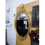 AN INTER-WAR YEARS GEORGIAN REVIVAL GILT-GESSO FRAMED MIRROR, WITH HUSK FESTOONS, 40" HIGH (101.6cm)