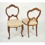 SET OF FOUR NINETEENTH CENTURY CARVED WALNUT DINING CHAIRS, each with floral cresting and beaded