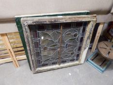 TWO SQUARE LEADED AND STAINED GLASS WINDOW PANELS, FOLIATE PATTERN (A.F.)