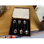 A CASED SET OF SIX SILVER COFFEE SPOONS WITH BEAN HANDLES