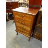 AN EDWARDIAN MAHOGANY SIX DRAWER SHEET MUSIC CABINET