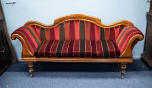VICTORIAN WALNUT DOUBLE SCROLL END SOFA, the shaped back enclosing a padded back, and set above