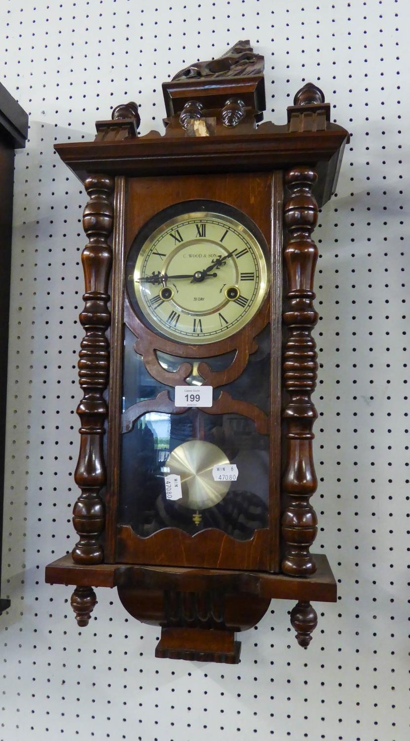 A VIENNA STYLE WALL CLOCK, THE ROMAN DIAL INSCRIBED 'C.  WOOD AND SON' WITH 31 DAY STRIKING