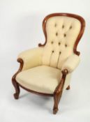 VICTORIAN CARVED WALNUT EASY ARMCHAIR, the deep buttoned and waisted back with moulded outline,