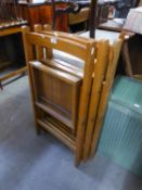 A SET OF THREE SLATTED WOODEN FOLDING CHAIRS (3)