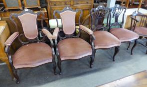 A PAIR OF EDWARDIAN CARVED ROSEWOOD DRAWING ROOM OPEN ARMCHAIRS, COVERED IN PINK VELVET AND A PAIR