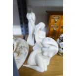 THREE ?ENESCO? WHITE CHINA STYLISED FEMALE FIGURES