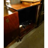 AN INLAID MAHOGANY TELEVISION CABINET AND A FLAT SCREEN TELEVISION