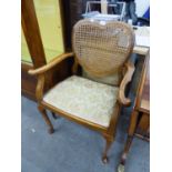 WALNUTWOOD ARMCHAIR HAVING LOVE HEART SHAPED CANE BACK ON CABRIOLE FRONT LEGS