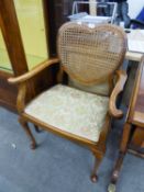 WALNUTWOOD ARMCHAIR HAVING LOVE HEART SHAPED CANE BACK ON CABRIOLE FRONT LEGS