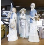NAO, SPANISH PORCELAIN, GIRL CARRYING TWO PUPPIES AND TWO FIGURES IN SIMILAR TASTE (3)