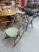 AN ERCOL STICK-BACK ROCKING CHAIR AND A MATCHING OPEN ARMCHAIR (2)