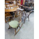 AN ERCOL STICK-BACK ROCKING CHAIR AND A MATCHING OPEN ARMCHAIR (2)