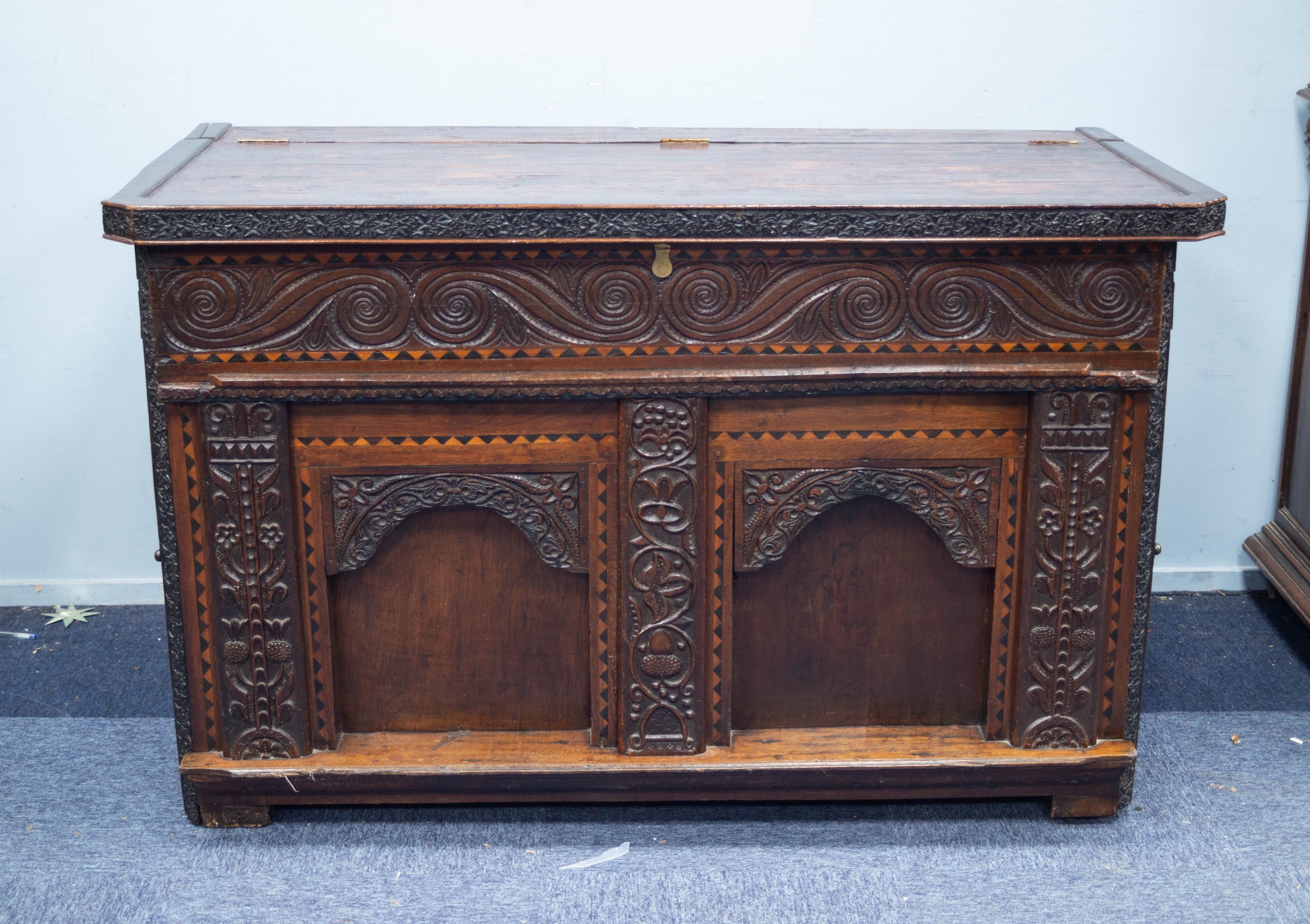 COMPOSITE SEVENTEENTH CENTURY AND LATER CARVED OAK AND STAINED PINE LARGE CHEST, the part hinged,