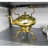 A LATE VICTORIAN BRASS TEA KETTLE WITH FIXED IN PART TURNED BLACKWOOD OVER-HEAD HANDLE, REMOVABLE
