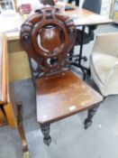 A VICTORIAN MAHOGANY SHIELD BACK HALL CHAIR