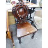 A VICTORIAN MAHOGANY SHIELD BACK HALL CHAIR