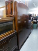 A 1930's MAHOGANY PART BEDROOM SUITE OF TWO DOOR WARDROBE, A DRESSING TABLE WITH STOOL AND A CABINET