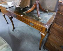 AN EDWARDIAN MAHOGANY LEATHER INSET TOP WRITING TABLE WITH TWO FRIEZE DRAWERS