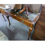 AN EDWARDIAN MAHOGANY LEATHER INSET TOP WRITING TABLE WITH TWO FRIEZE DRAWERS