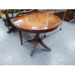 BEVEN AND FUNNEL REGENCY STYLE MAHOGANY CIRCULAR LOW OCCASIONAL TABLE, ON COLUMN AND SWEPT QUARTETTE