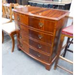 A REPRODUCTION MAHOGANY BOW-FRONT CHEST OF FOUR DRAWERS