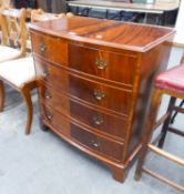 A REPRODUCTION MAHOGANY BOW-FRONT CHEST OF FOUR DRAWERS