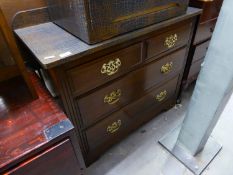 EDWARDIAN MAHOGANY CHEST OF TWO SHORT AND TWO LONG GRADUATED DRAWERS, THE BRASS DROP HANDLES