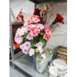 THREE LARGE GLASS VASES, AND A SELECTION OF FABRIC DISPLAY FLOWERS