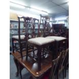 THREE EARLY TWENTIETH CENTURY MAHOGANY CHIPPENDALE REVIVAL SINGLE DINING CHAIRS, WITH OPENWORK SPLAT