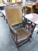 AN EARLY 1900's OAK STEEL SPRING ROCKING CHAIR