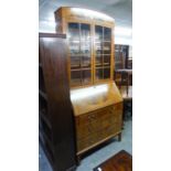 AN EDWARDIAN MAHOGANY BUREAU BOOKCASE