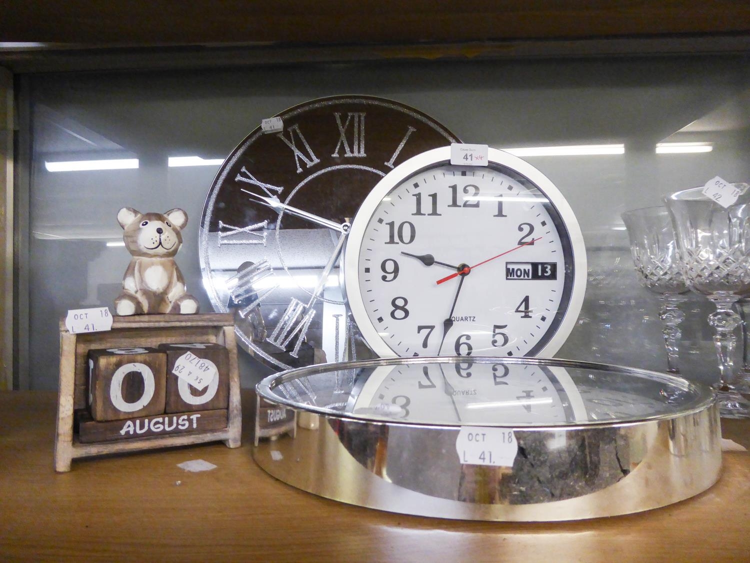 A MIRROR GLASS CIRCULAR QUARTZ WALL  CLOCK; A WOODEN PERPETUAL CALENDAR WITH TEDDY BEAR