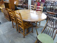 AN ERCOL EXTENDING D-END DINING TABLE, WITH FOLD-AWAY LEAF AND A SET OF FOUR ERCOL LADDER BACK