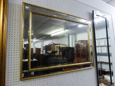 A RECTANGULAR BEVELLED EDGE WALL MIRROR, WITH BEVELLED MIRROR GLASS AND GILT FRAME