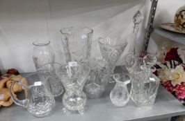 A SELECTION OF CUT GLASS VASES, TO INCLUDE; A LARGE VASE 30.5cm HIGH, WITH ROSE ETCHED DECORATION, A