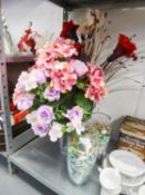 THREE LARGE GLASS VASES, AND A SELECTION OF FABRIC DISPLAY FLOWERS