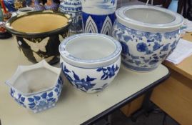 LARGE ORIENTAL BLUE AND WHITE PORCELAIN LARGE JARDINIERE WIHT FOLIATE DECORATED EXTERIOR, 12in (30.