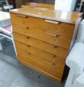 A MODERN TEAK CHEST OF FIVE GRADUATED LONG DRAWERS