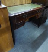 A MAHOGANY KNEEHOLE WRITING TABLE, WITH GREEN LEATHER LINED TOP, ONE LONG AND TWO SHORT DRAWERS,