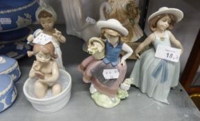 TWO LLADRO FIGURES OF YOUNG GIRLS, AND A LLADRO GROUP FIGURE OF A YOUNG GIRL TAKING A BATH (3)