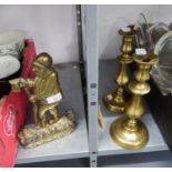 PAIR OF ANTIQUE BRASS EJECTOR CANDLESTICKS, 10 ½? high, and a FIGURAL BRASS DOOR STOP, A SUP OF