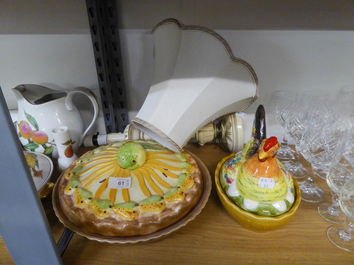 A LARGE CIRCULAR PIE DISH AND COVER, A HEN ON NEST, AND A WOODEN TABLE LAMP (3)