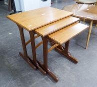 A NEST OF THREE G-PLAN TEAK OBLONG COFFEE TABLES, ON TRESTLE TYPE SUPPORTS