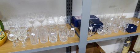 A LARGE QUANTITY OF CUT GLASS DRINKING GLASSES TO INCLUDE; A PAIR OF ROYAL SCOT CRYSTAL TUMBLERS (