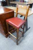 A LATE VICTORIAN BEECHWOOD TALL SEATED CHILD'S CHAIR WITH STRETCHERED SQUARE LEGS AND RED LEATHER