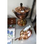 AN EARLY TWENTIETH CENTURY COPPER AND BRASS TEA URN, ALSO A COPPER KETTLE (2)