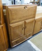 ERCOL BLONDE ELM DRINKS CABINET, WITH UPRIGHT FALL-FRONT OVER A CUPBOARD WITH TWO DOORS AND ONE LONG